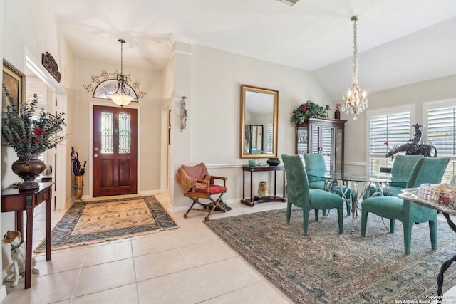 8611 Torry Vw, Houston, TX 77095 - foyer featuring a chandelier, lofted ceiling, tile patterned flooring, and baseboards