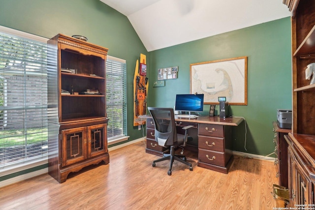 8611 Torry Vw, Houston, TX 77095 - office featuring wood finished floors, vaulted ceiling, and baseboards