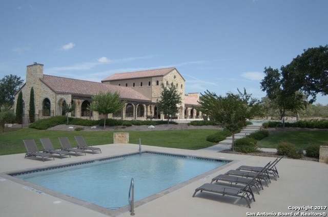 339 Sugarcane, New Braunfels, TX 78132 - community pool featuring a patio area and a yard