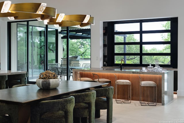 24607 Cliff Line, San Antonio, TX 78257 - indoor wet bar featuring healthy amount of natural light