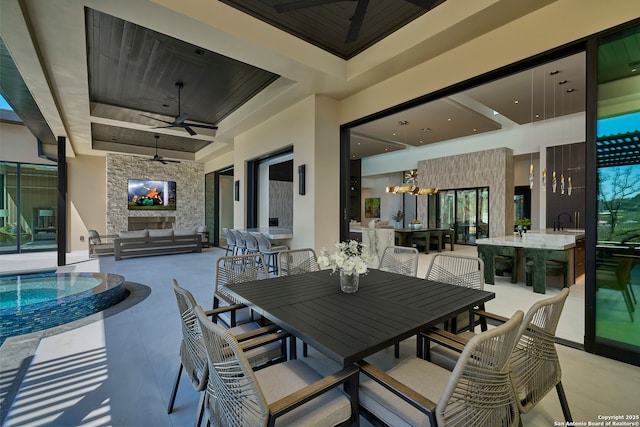 24607 Cliff Line, San Antonio, TX 78257 - view of patio / terrace featuring a ceiling fan, outdoor dining area, an outdoor pool, and a sink