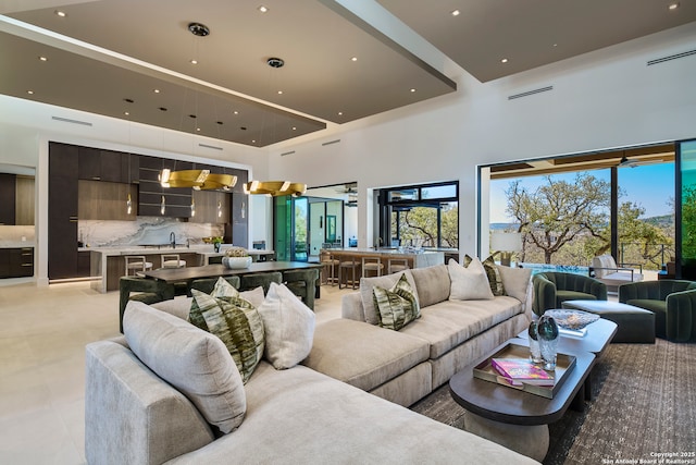 24607 Cliff Line, San Antonio, TX 78257 - living area featuring a towering ceiling and recessed lighting