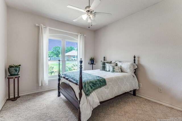 121 Maderas, Seguin, TX 78155 - bedroom with light carpet, baseboards, and ceiling fan