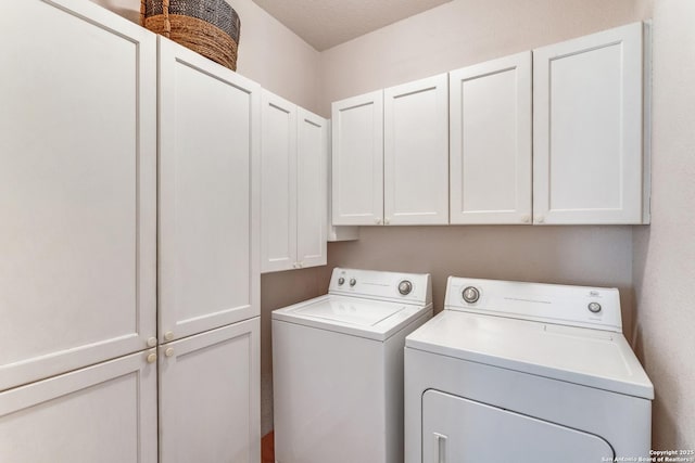 121 Maderas, Seguin, TX 78155 - laundry area with cabinet space and washing machine and clothes dryer