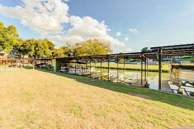 121 Maderas, Seguin, TX 78155 - dock area with a water view, a lawn, and boat lift