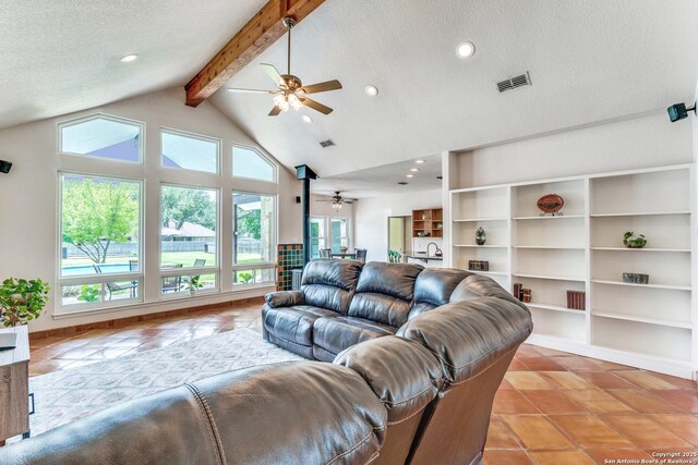 121 Maderas, Seguin, TX 78155 - living area with ceiling fan, light tile patterned floors, a textured ceiling, recessed lighting, and baseboards
