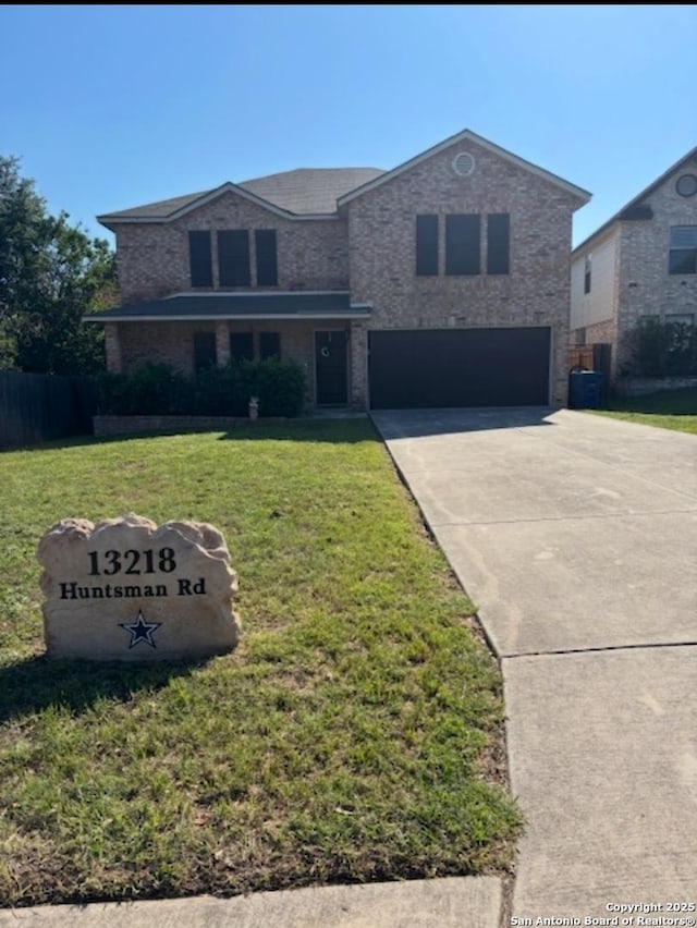 13218 Huntsman Rd, San Antonio, TX 78249 - traditional-style house featuring a garage, concrete driveway, and brick siding