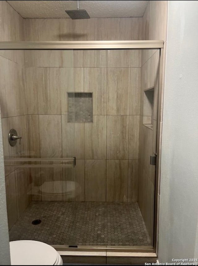 13218 Huntsman Rd, San Antonio, TX 78249 - full bathroom featuring toilet and a stall shower