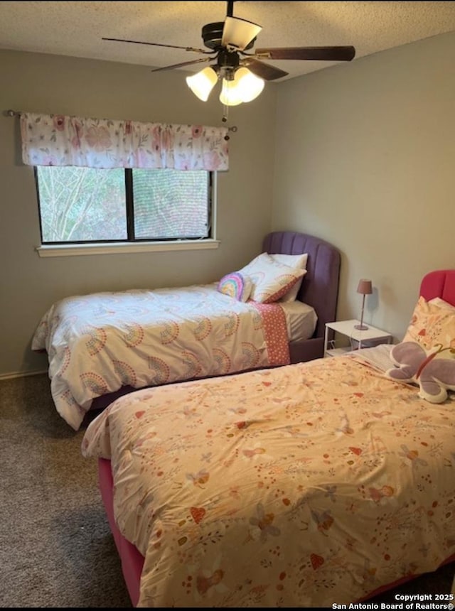 13218 Huntsman Rd, San Antonio, TX 78249 - bedroom with multiple windows, carpet, and a ceiling fan