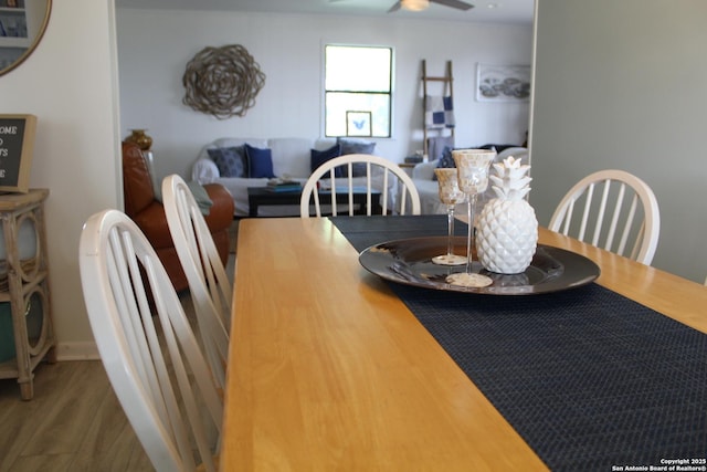 38 Peggy, Palacios, TX 77465 - dining space with ceiling fan and wood finished floors