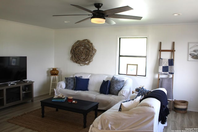 38 Peggy, Palacios, TX 77465 - living area with ornamental molding, a ceiling fan, wood finished floors, baseboards, and recessed lighting
