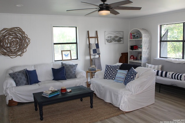 38 Peggy, Palacios, TX 77465 - living area with wood finished floors, ceiling fan, and ornamental molding
