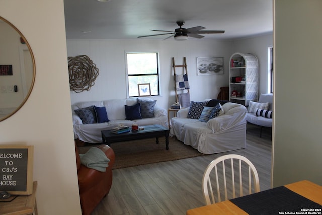 38 Peggy, Palacios, TX 77465 - living area with wood finished floors and a ceiling fan