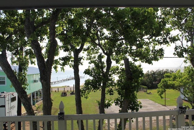 38 Peggy, Palacios, TX 77465 - view of grassy yard featuring a water view and a balcony