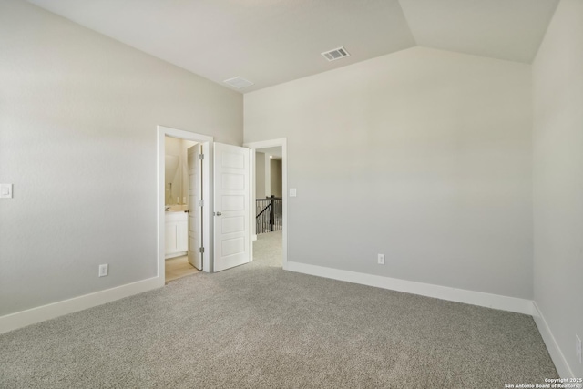 1411 Arcas Way, San Antonio, TX 78245 - unfurnished room with light colored carpet, lofted ceiling, and baseboards