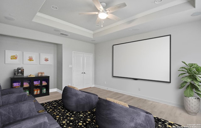 14139 Sam Houston, San Antonio, TX 78253 - home theater room with a raised ceiling, crown molding, wood finished floors, ceiling fan, and baseboards