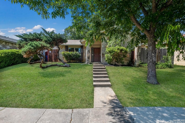 6518 Spring Hurst Dr, San Antonio, TX 78249 - obstructed view of property with stone siding