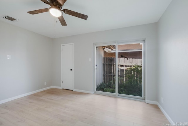 6518 Spring Hurst Dr, San Antonio, TX 78249 - spare room featuring light wood-style floors, ceiling fan, and baseboards