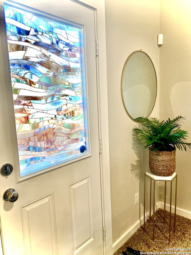 7003 Emerald Vly, San Antonio, TX 78242 - doorway featuring baseboards and carpet floors
