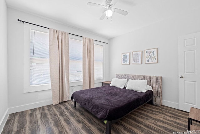 402 E Dewey, San Antonio, TX 78212 - bedroom with wood finished floors, baseboards, and a ceiling fan
