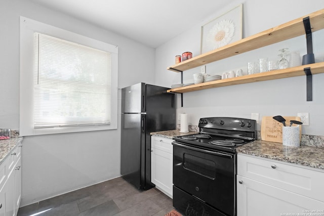 402 E Dewey, San Antonio, TX 78212 - kitchen with black appliances, open shelves, light stone counters, and white cabinets
