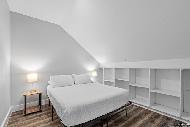 402 E Dewey, San Antonio, TX 78212 - bedroom featuring dark wood-style flooring, vaulted ceiling, and baseboards