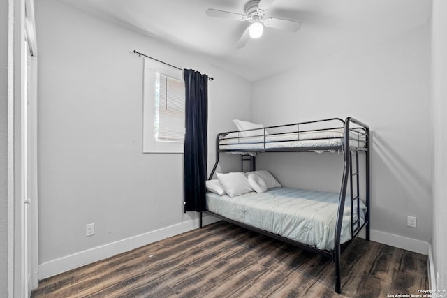 402 E Dewey, San Antonio, TX 78212 - bedroom featuring baseboards, wood finished floors, and a ceiling fan