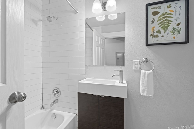 402 E Dewey, San Antonio, TX 78212 - full bathroom with  shower combination, vanity, and a textured wall