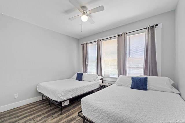 402 E Dewey, San Antonio, TX 78212 - bedroom featuring baseboards, wood finished floors, and a ceiling fan