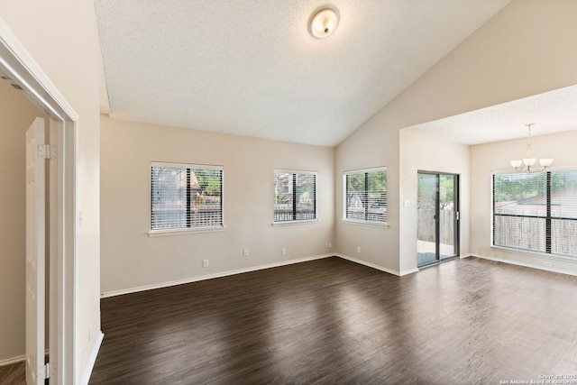 5626 Spring Sunshine, San Antonio, TX 78247 - empty room featuring a chandelier, plenty of natural light, dark wood-style flooring, baseboards, and a textured ceiling