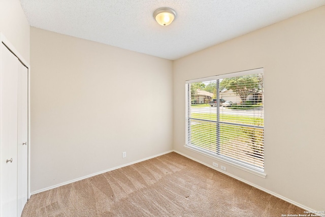 5626 Spring Sunshine, San Antonio, TX 78247 - empty room featuring light carpet and baseboards