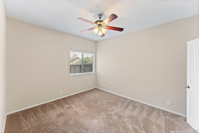 5626 Spring Sunshine, San Antonio, TX 78247 - spare room with carpet floors, ceiling fan, baseboards, and a textured ceiling
