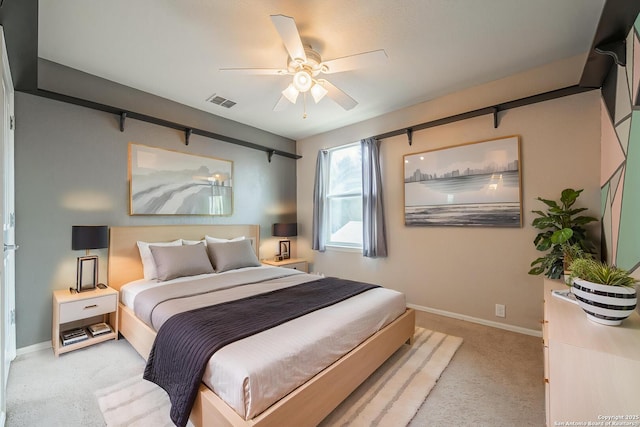 3407 Maguey Trl, San Antonio, TX 78245 - carpeted bedroom with baseboards and a ceiling fan
