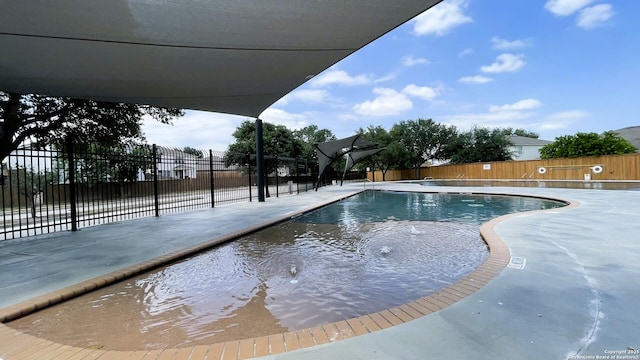 3407 Maguey Trl, San Antonio, TX 78245 - community pool with a fenced backyard and a patio area