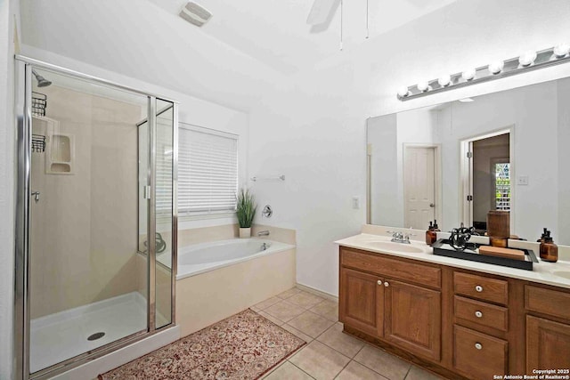 3714 Cotoneaster, San Antonio, TX 78261 - full bathroom featuring a bath, vanity, a shower stall, tile patterned flooring, and a ceiling fan