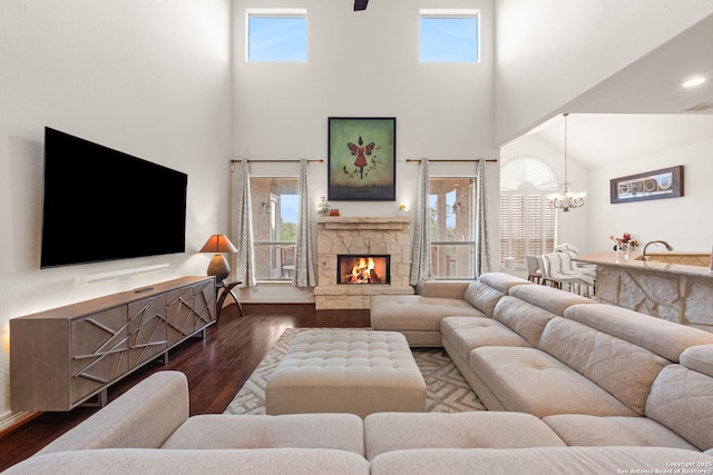 846 Fawnway, San Antonio, TX 78260 - living area with a high ceiling, a chandelier, dark wood-type flooring, and healthy amount of natural light