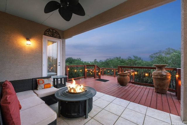 846 Fawnway, San Antonio, TX 78260 - deck at dusk featuring a fire pit and a ceiling fan