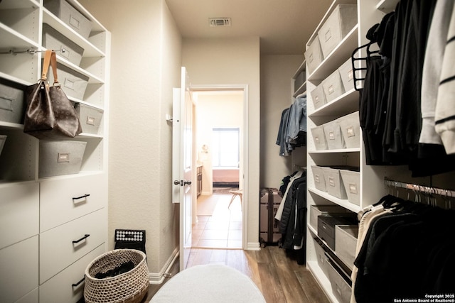 12805 Big Tank Rnch, San Antonio, TX 78245 - spacious closet with wood finished floors