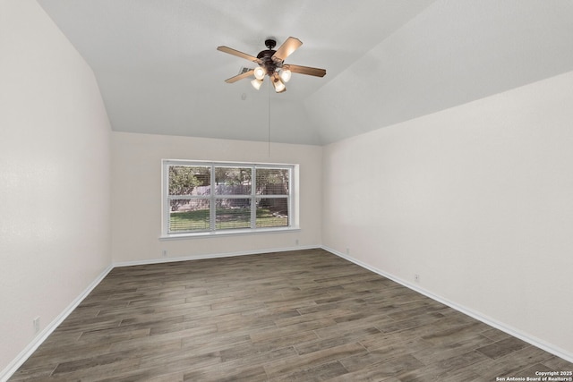 1015 Water Lily, San Antonio, TX 78260 - spare room with a ceiling fan, vaulted ceiling, wood finished floors, and baseboards