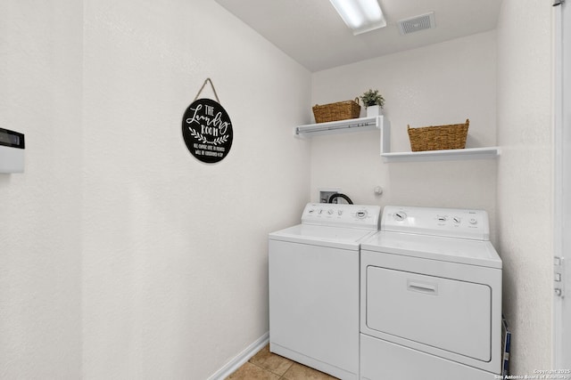 1015 Water Lily, San Antonio, TX 78260 - laundry room featuring independent washer and dryer, light tile patterned floors, and baseboards