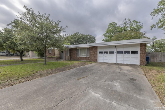 4326 Hall Park, San Antonio, TX 78218 - ranch-style house with an attached garage, brick siding, and concrete driveway