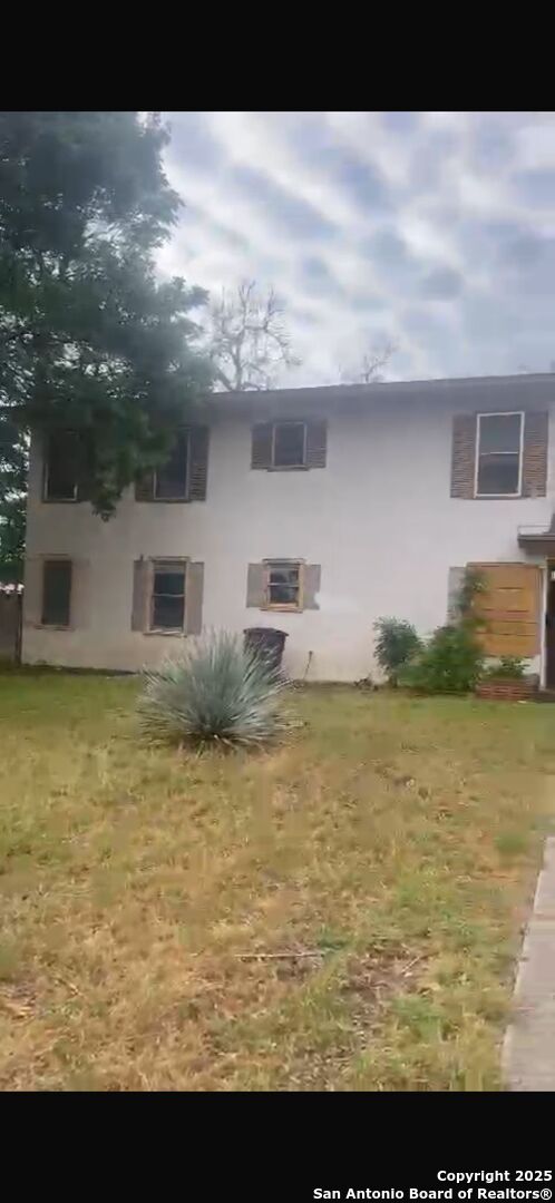466 Bryn Mawr, San Antonio, TX 78209 - view of side of home with stucco siding
