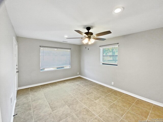 1002 Chevy Chase, San Antonio, TX 78209 - spare room featuring ceiling fan, recessed lighting, baseboards, and light tile patterned floors
