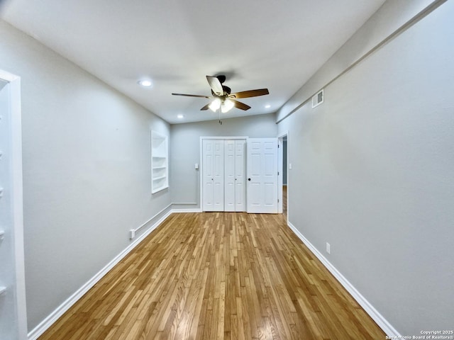 1002 Chevy Chase, San Antonio, TX 78209 - unfurnished bedroom with wood finished floors, baseboards, a closet, a ceiling fan, and recessed lighting