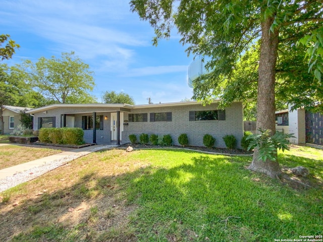 1002 Chevy Chase, San Antonio, TX 78209 - single story home with a front yard and brick siding