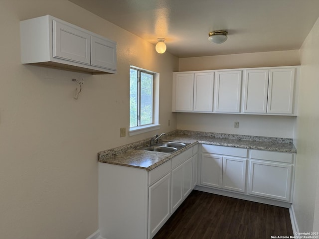 827 Horseshoe, Universal City, TX 78148 - kitchen with a sink, dark wood finished floors, white cabinets, and light countertops