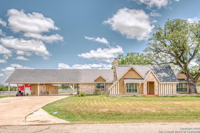 701 Steele, Smiley, TX 78159 - multi unit property with stone siding, a carport, a chimney, and driveway