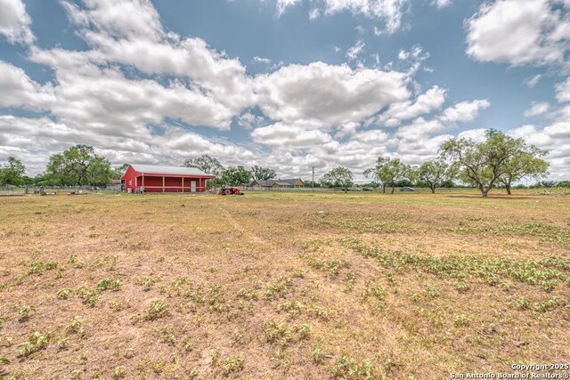 701 Steele, Smiley, TX 78159 - view of grassy yard featuring a view of rural / pastoral area and an outbuilding