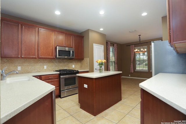 3410 Port Pl, San Antonio, TX 78253 - kitchen with stainless steel appliances, a sink, tasteful backsplash, light countertops, and recessed lighting