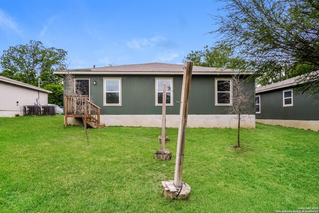 2434 Bermuda, San Antonio, TX 78222 - view of front facade with a front lawn and central AC unit